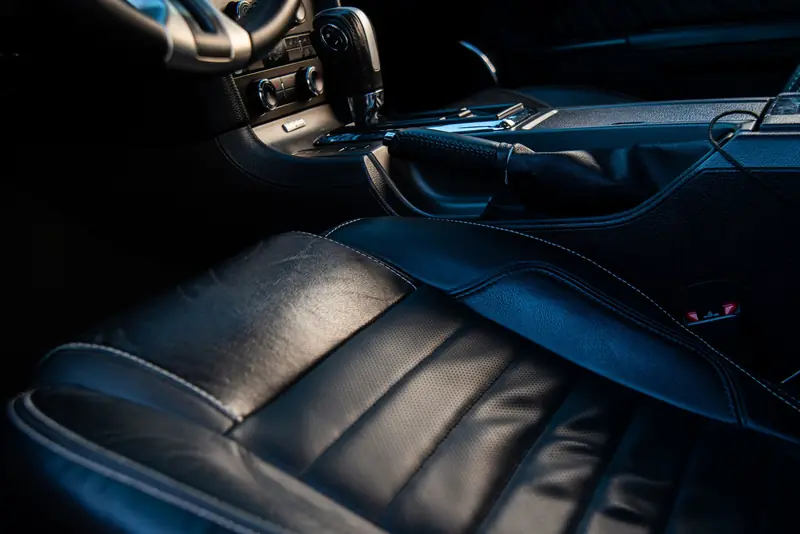 Close-up of a luxurious car interior with leather seating, showcasing style and comfort